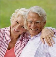 two smiling elderly people